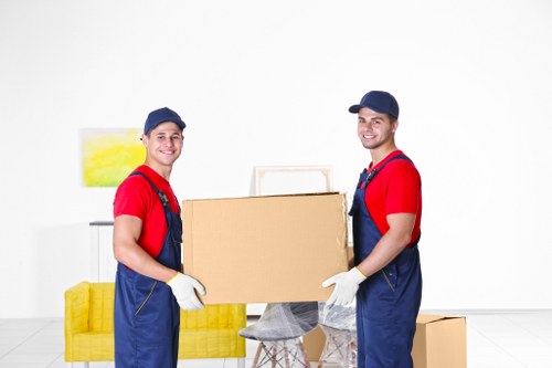 Professional home move planning in Richmond with packed boxes and a moving van