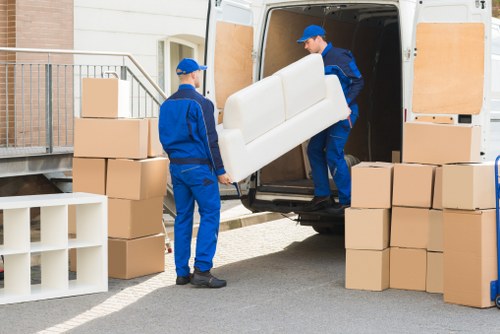 Team checking details for a removal service complaint