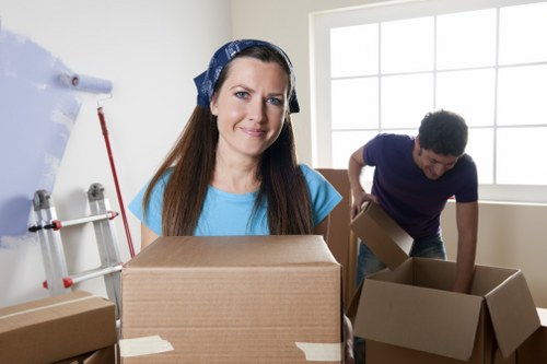 Professional movers carrying furniture during house removals in Richmond