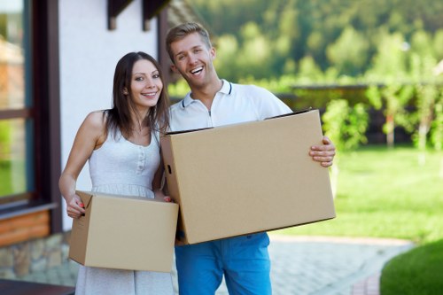 Packed moving boxes and furniture ready for a Richmond house move