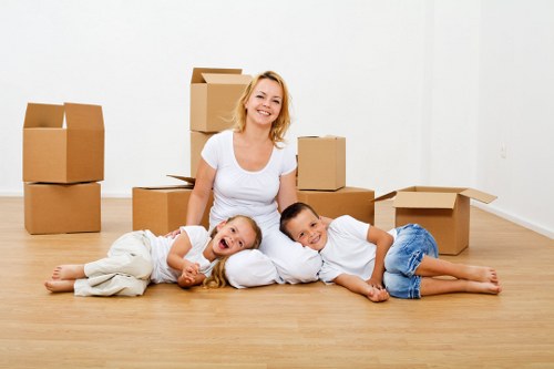 Packed boxes and moving supplies ready for a flat removal in Richmond