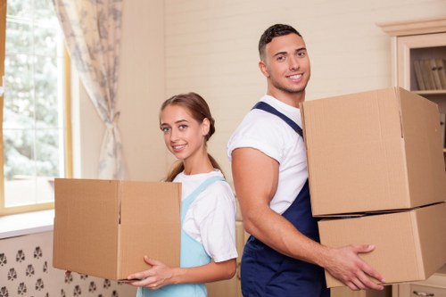 Professional movers handling household items in Richmond