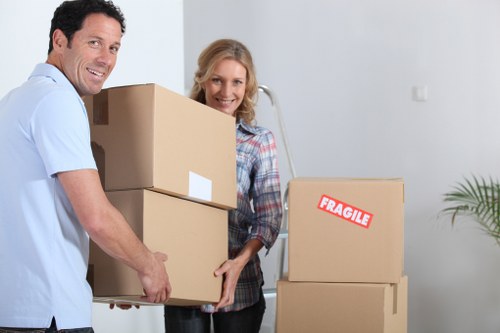 Packed office boxes and technology ready for a Richmond business move